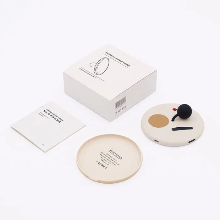 Mini q Handheld Makeup Mirror